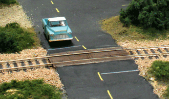 O WOOD PLANK GRADE CROSSING